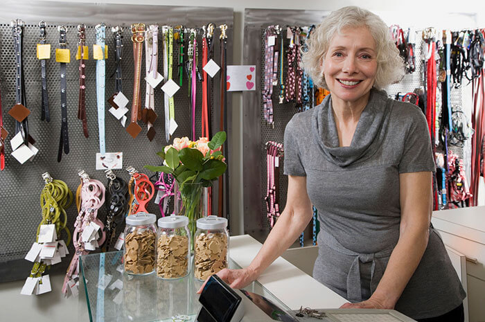 senior pet shop owner senior pet shop owner